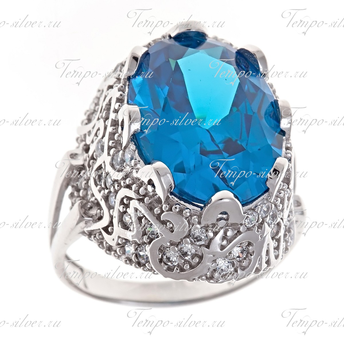 Кольцо из серебра с крупным голубым камнем на широкой декорированной подножке цена