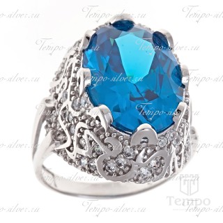 Кольцо из серебра с крупным голубым камнем на широкой декорированной подножке