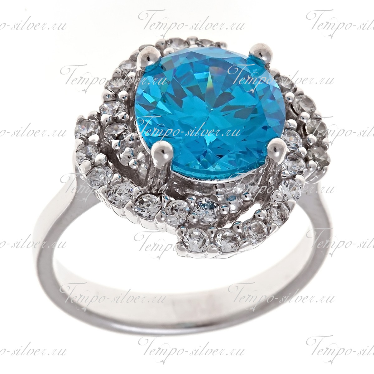 Кольцо из серебра с крупным голубым камнем в центре композиции в форме цветка