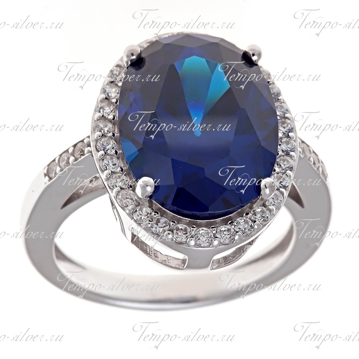 Кольцо из серебра с крупным синим камнем в окружении белых куб.цирконий цена