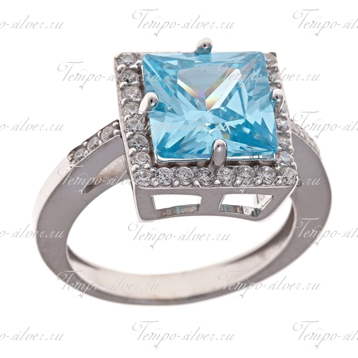 Кольцо из серебра квадратной формы с голубым камнем в окружении белых куб.цирконий  цена