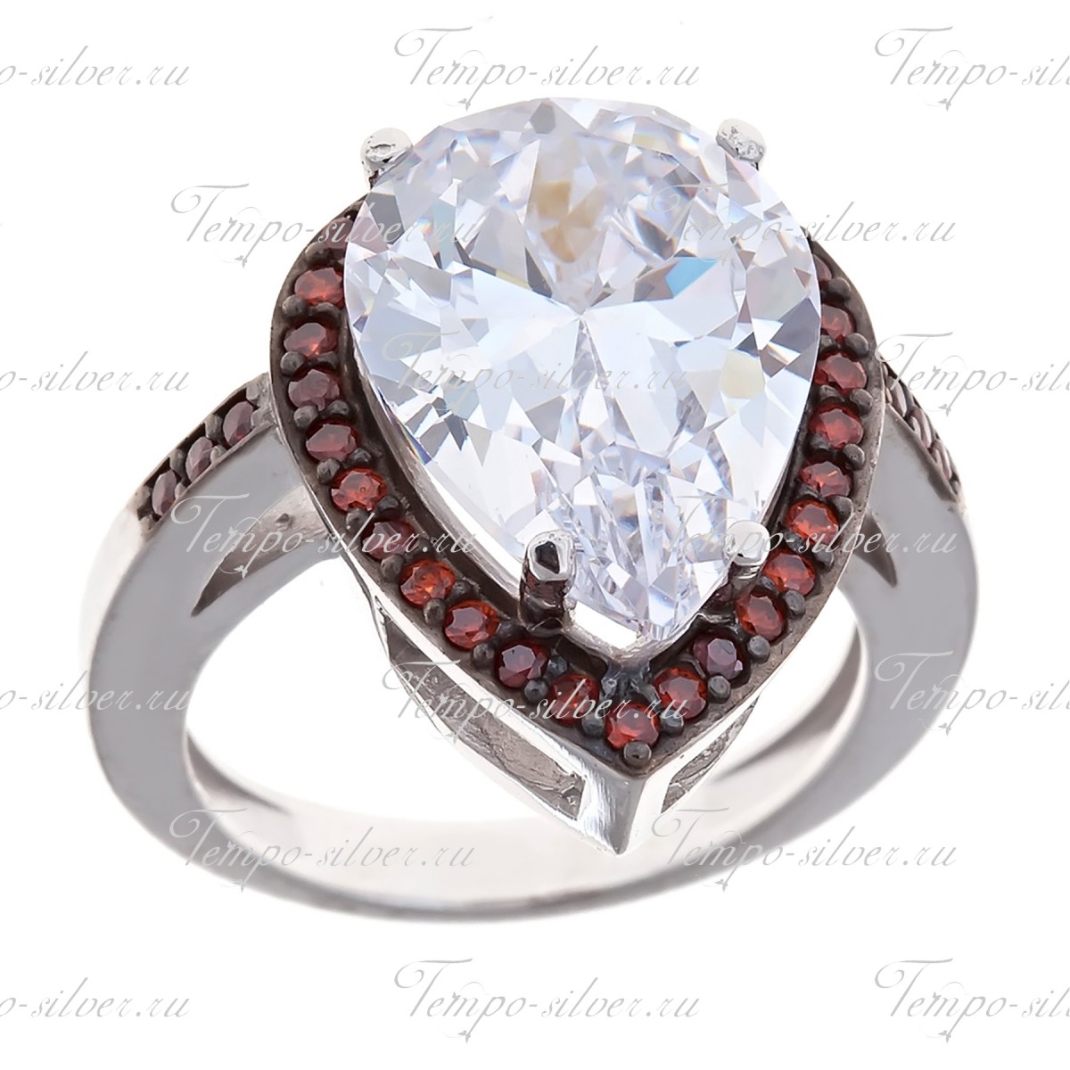 Кольцо серебряное в форме капли с большим камнем и ободком из красных камней цена