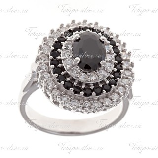 Кольцо из серебра овальной формы с черно-белыми камнями