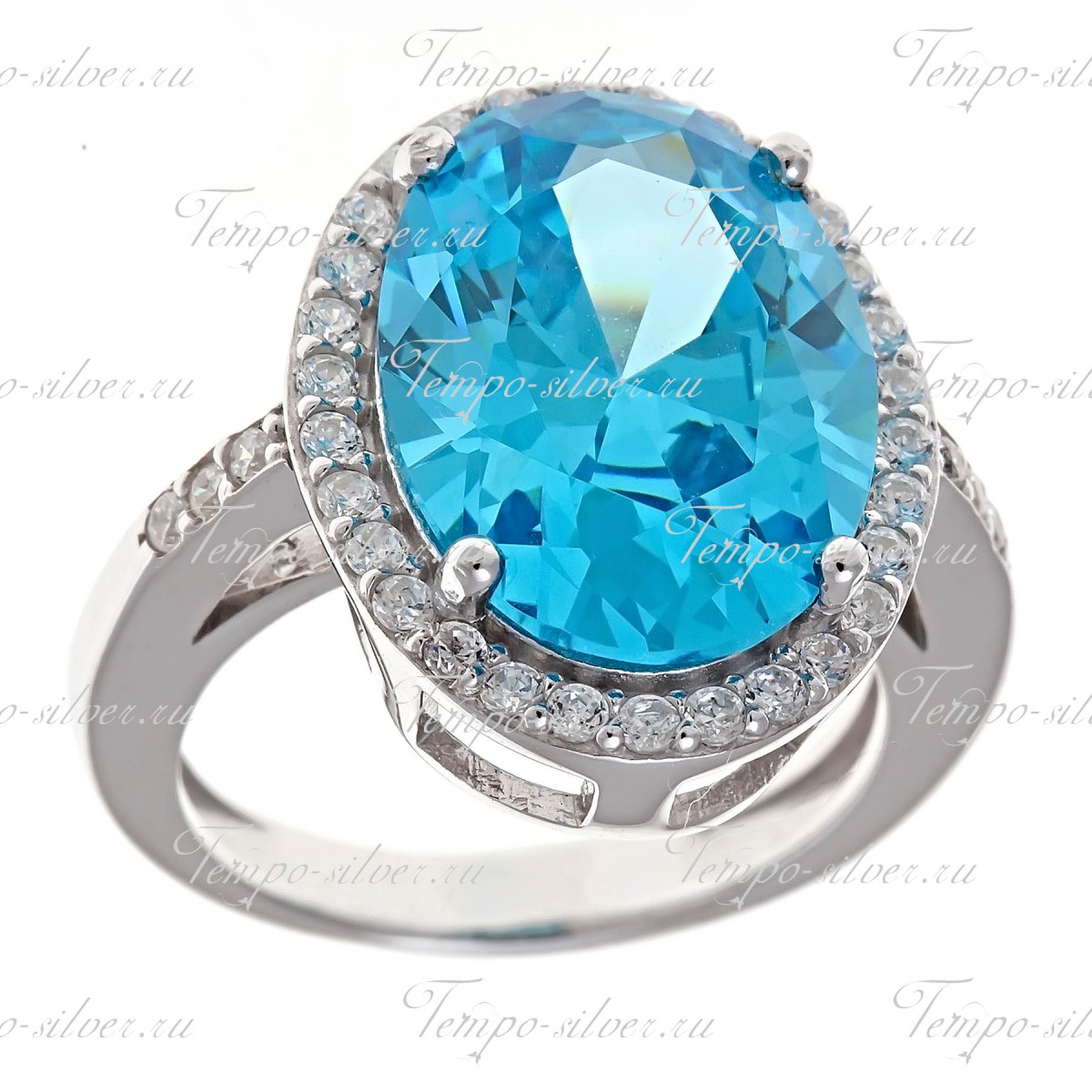 Кольцо из серебра с крупным голубым камнем овальной формы, окруженный россыпью белых камней